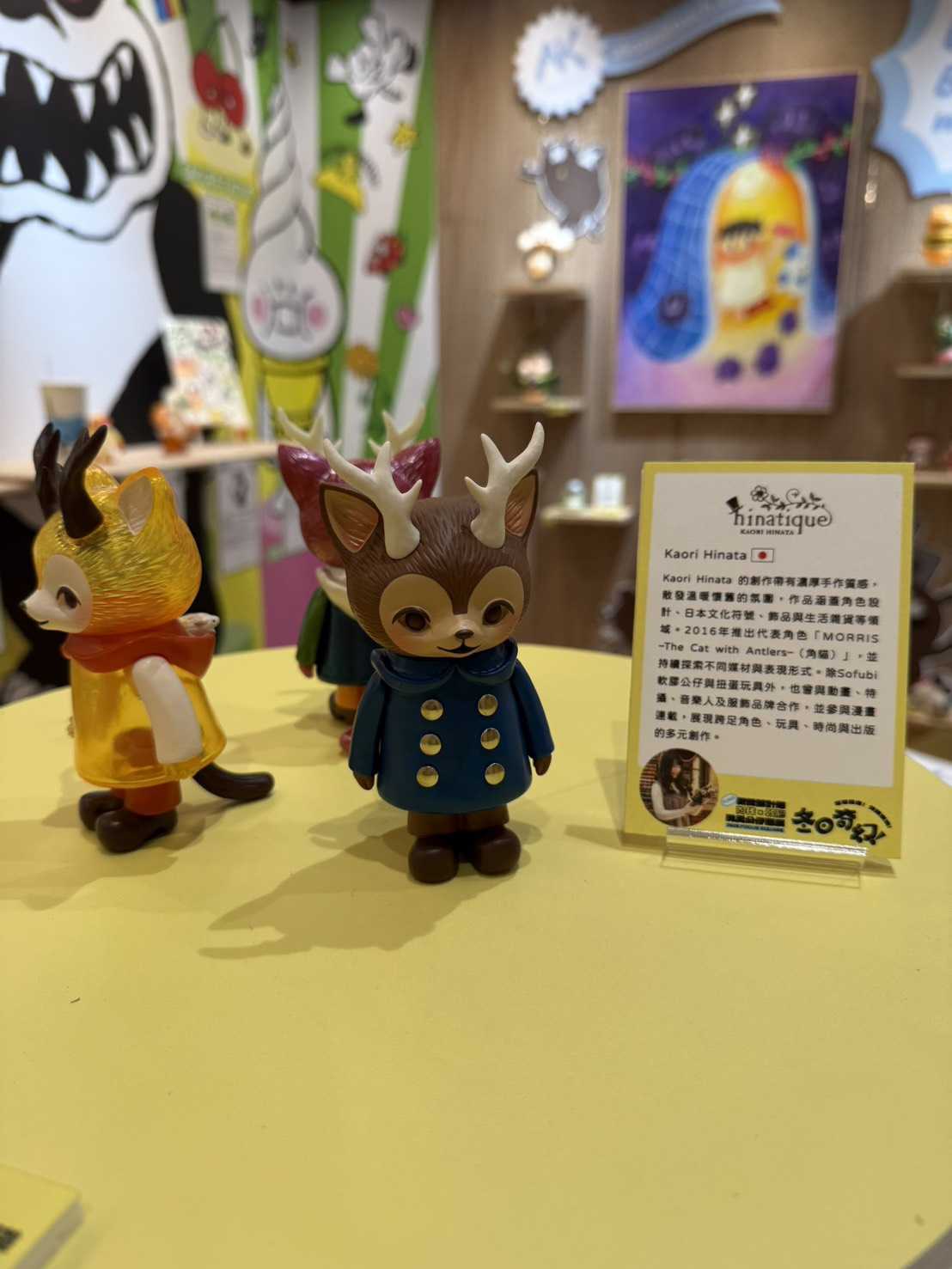 Hinatique figures by Kaori Hinata on display with their introduction card at Winter Fantasy